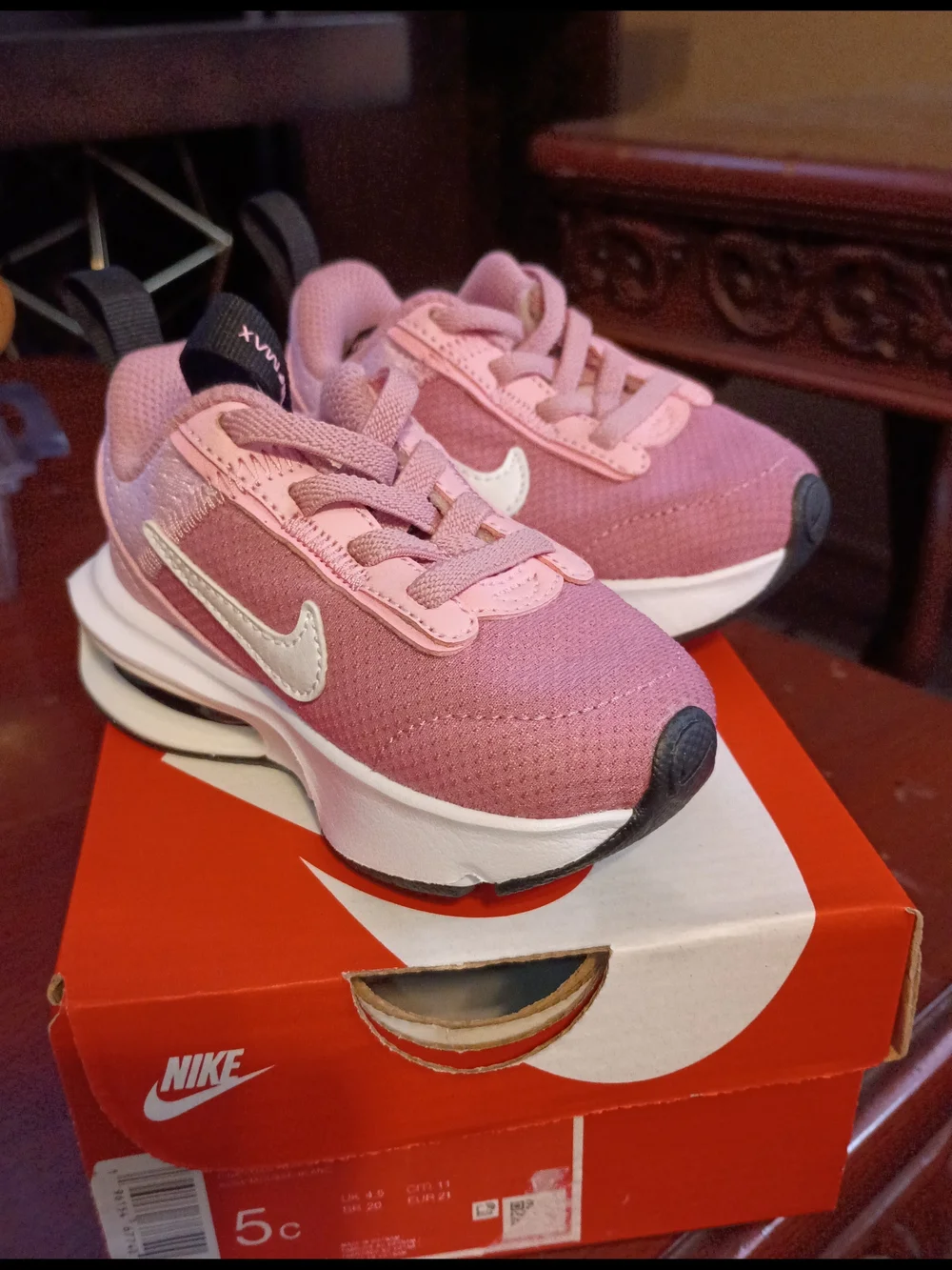 Nike Kids Pink Mesh Sneakers with White Swoosh and Black Heel
